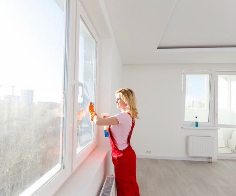 Cleaning Windows Woman - Post Construction Cleaning Checklist in Seattle
